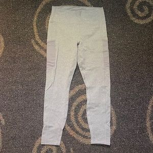 Grey and black fabletics power hold leggings W/ mesh pockets